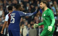 Goalkeeper Gianluigi Donnarumma (R) needed to be at his best as Paris Saint-Germain held on against Aston Villa on Tuesday to reach the Champions League semi-finals