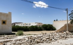 Residents of Mezzouna say it took first responders too long to reach the town after the school wall collapsed, crushing three young adults.