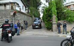 Vehicles escorted by Italian police enter the Omani embassy in Rome