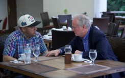 A photo posted on social media by US Senator Chris Van Hollen (R) shows him meeting with Salvadoran migrant Kilmar Abrego Garcia (L), a US resident deported to his home country, at a hotel in San Salvador, El Salvador, on April 17, 2025