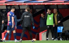 Barcelona's Polish forward Robert Lewandowski went off hurt against Celta Vigo on Saturday