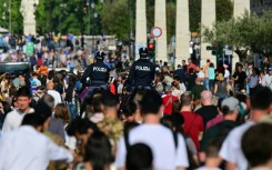 Crowds in a Rome street near the Vatican, a day after Pope Francis's death