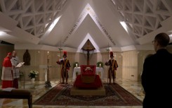 The Vatican released images of the pope in his open casket