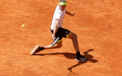 Germany's Alexander Zverev returns the ball to Spain's Roberto Bautista Agut