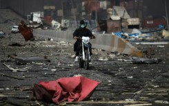 The blast carpeted a boulevard with debris