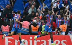 Crystal Palace's Ismaila Sarr (R) celebrates after scoring against Aston Villa