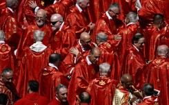 Cardinals embraced after Pope Francis's funeral ceremony in St Peter's Square at the Vatican