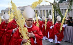 Convicted Italian cardinal Angelo Becciu at a Palm Sunday procession at the Vatican
