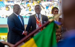 Oligui (C) was sworn in in a ceremony attended by numerous African leaders, including the president of the Democratic Republic of Congo Felix Tshisekedi (L)