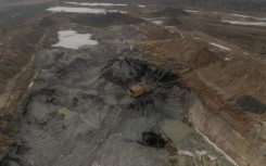 A dragline excavator operates in an open-pit titanium mine in the Zhytomyr region of Ukraine in February 2025