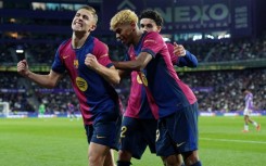 Barcelona midfielder Fermin Lopez celebrates scoring the winner against Valladolid