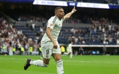 Real Madrid's French forward Kylian Mbappe celebrates after scoring his second against Celta Vigo