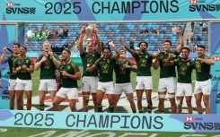 South Africa poses with the trophy after winning the Men's 2025 HSBC Rugby Sevens LA World Championship