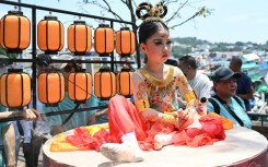 Tourists from Communist Party-ruled mainland China visited Hong Kong to experience traditional Chinese culture not often seen back home