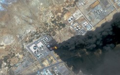 A handout satellite photo from Planet Labs PBC dated May 6 shows smoke billowing from a fuel storage depot in Port Sudan