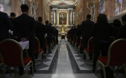 Employees assisting the cardinals in the conclave take an oath of secrecy