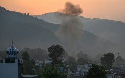 Smoke rises in the main town of Poonch, in India on May 7, 2025