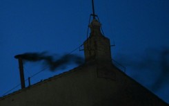 Black smoke billowed from a chimney above the Sistine Chapel after the first day of conclave