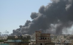 Smoke billows over Port Sudan after a paramilitary drone strike on the army-contolled aid hub on Tuesday.