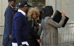 Combs was joined at the courthouse by his mother Janice