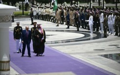 Saudi Crown Prince Mohammed Bin Salman and US President Donald Trump review the honour guard at the Royal Court in Riyadh