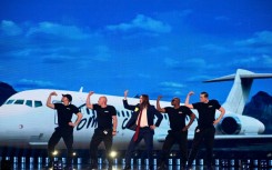 Estonian singer Tommy Cash (C) made it through to the Eurovision final with his song 'Espresso Macchiato'