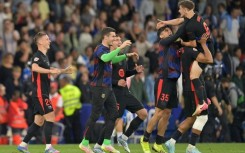 Barcelona players celebrate after winning the La Liga title for the 28th time