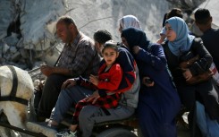 Palestinians flee the northern cities of Jabalia and Beit Lahia towards Gaza City amid continuous Israeli strikes
