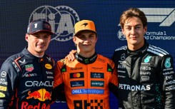 (From L) Second-placed Red Bull Racing's Max Verstappen, first-placed McLaren's Oscar Piastri and third-placed Mercedes' George Russell after qualifying for the Emilia Romagna Formula One Grand Prix at Imola