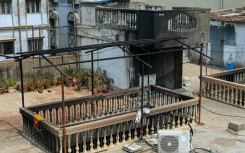 Scenes of damage from a fire at the Krishna Pearls building in Hyderabad, which killed at least 17 people