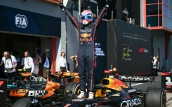 Max Verstappen produced a fine drive to fend off the McLarens at Imola