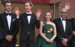 Wes Anderson and cast of 'The Phoenician scheme' on the red carpet
