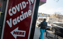 A pharmacy advertises the COVID-19 vaccine as the nation marks the fifth anniversary of the Covid-19 pandemic on March 13, 2025 in New York City