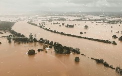 One man was found dead in a flooded home in eastern Australia