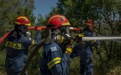 Volunteer firefighters are holding practice drills to prepare for fire season in the Athens suburbs