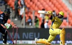 Chennai Super Kings' Devon Conway hammered 52 from 35 balls before he was clean bowled by Gujarat's Rashid Khan