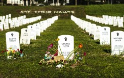 George Floyd is among model headstones bearing the names of people killed by law enforcement in the 'Say Their Names' cemetery in Minneapolis