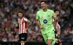 Barca's Robert Lewandowski netted twice to pass a century of goals for the club