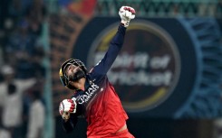 Royal Challengers Bengaluru's Jitesh Sharma celebrates his team's win against Lucknow Super Giants in the Indian Premier League