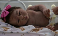 At a store in the Brazilian city of Campinas, 'reborn babies', complete with nails, eyelashes and veins, are displayed in life-sized incubators