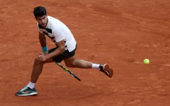 Carlos Alcaraz is aiming to become the first back-to-back men's champion since Rafael Nadal won four in a row from 2017-2020