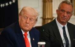 US President Donald Trump (L) and Health Secretary Robert F. Kennedy Jr. at the release of the MAHA report at the White House on May 22, 2025