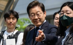 Both frontrunner Lee  of the liberal Democratic Party and conservative challenger Kim Moon-soo have cast the race as a battle for the soul of the country