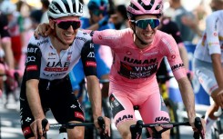 Twin brothers Adam and Simon Yates (in pink) on Sunday as Simon won the 2025 Giro