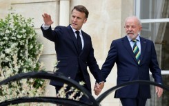 President Emmanuel Macron stressed that Kyiv and Moscow should not be treated as equals