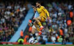 Wolves' Rayan Ait-Nouri (front) is set to join Man City