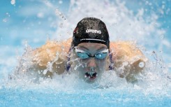 Gretchen Walsh wins the women's 100m butterfly at the US Swimming Championships, selection meet for the 2025 World Championships in Singapore