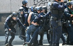 Law enforcement clashed with demonstrators outside the Metropolitan Detention Center, MDC, during a protest following federal immigration operations