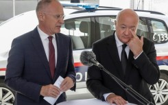 Austrian Chancellor Christian Stocker (R) declared three days of national mourning