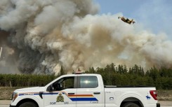 More than 220 wildfires are burning across Canada, with 3.3 million hectares (12,700 square miles) already consumed so far this year